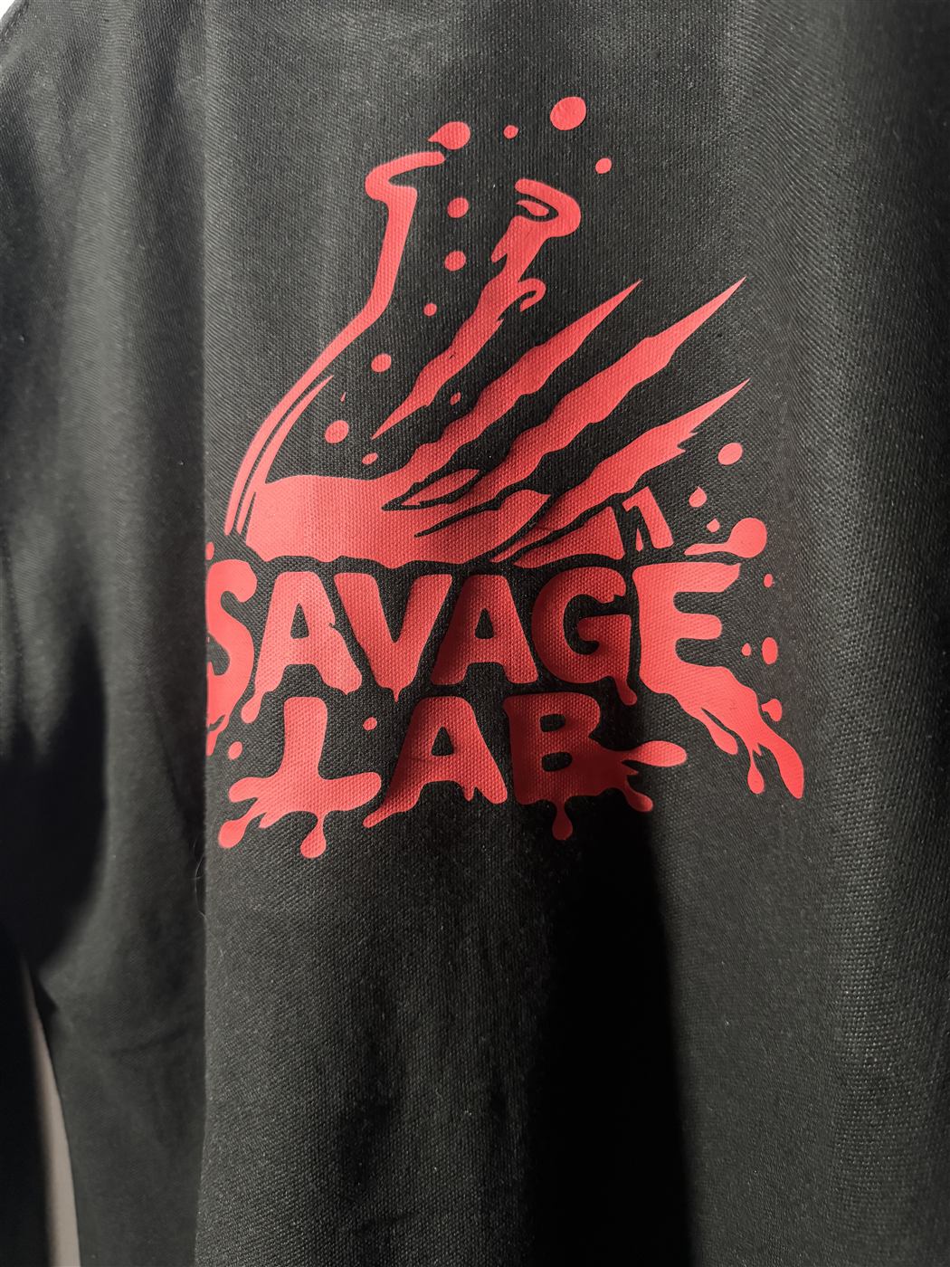 Red printed logo on a black t-shirt